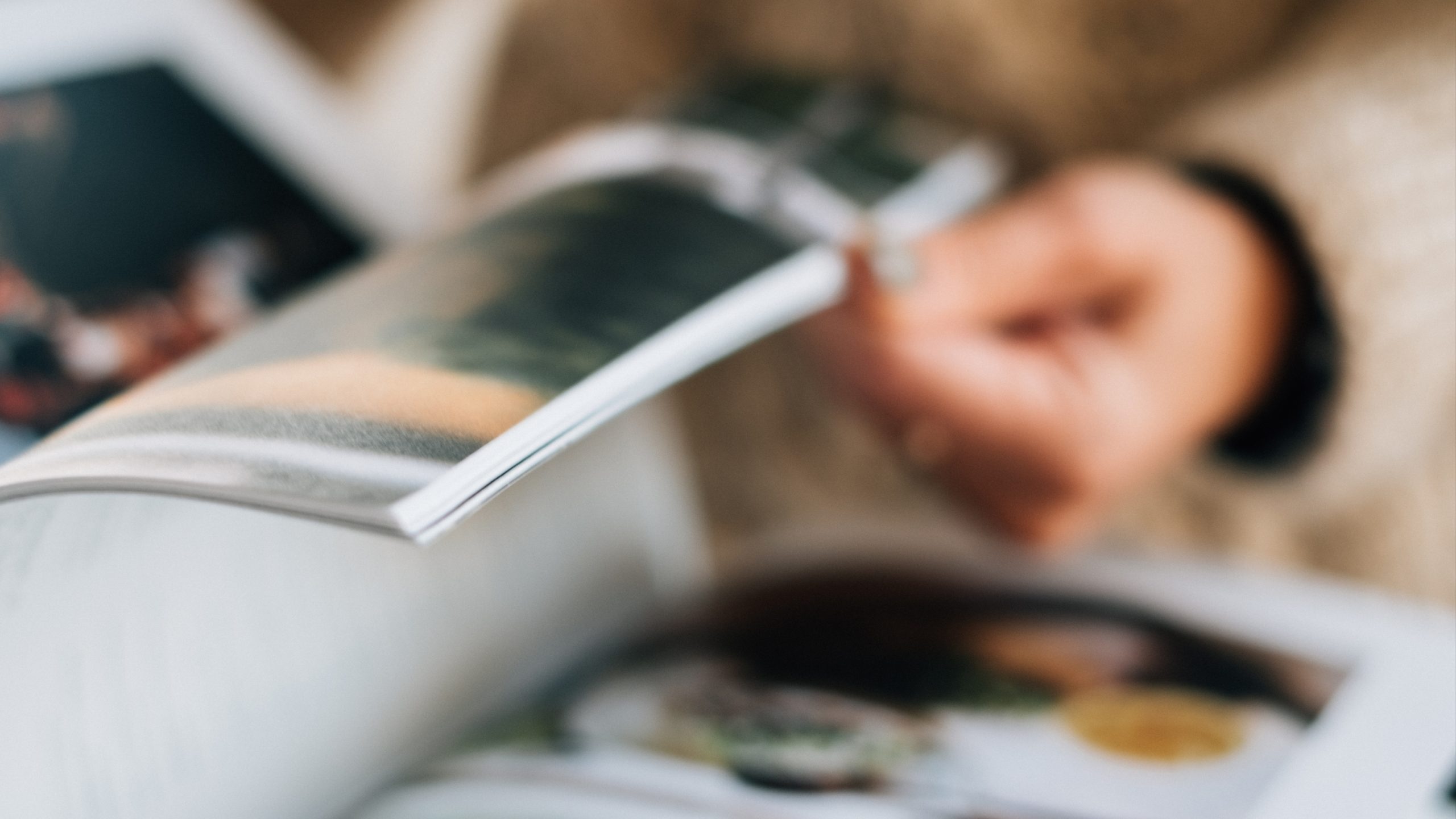 a person reading up on data analytics in publishing