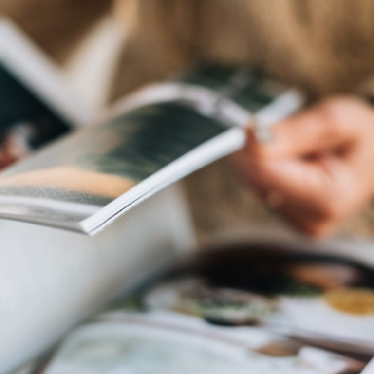 a person reading up on data analytics in publishing